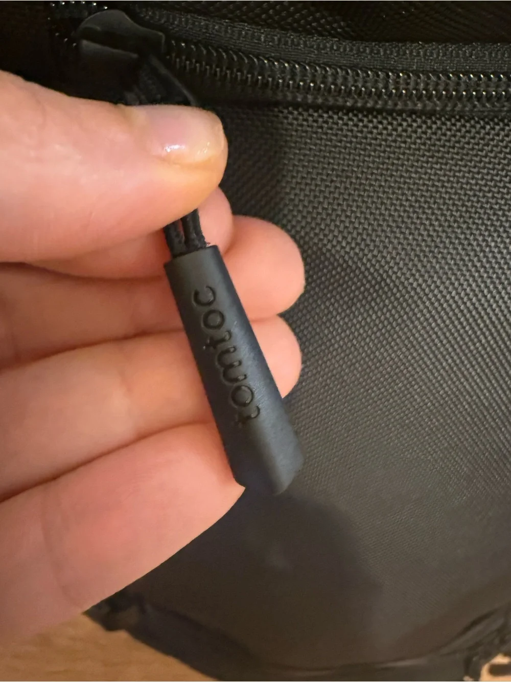 Tomtoc black backpack